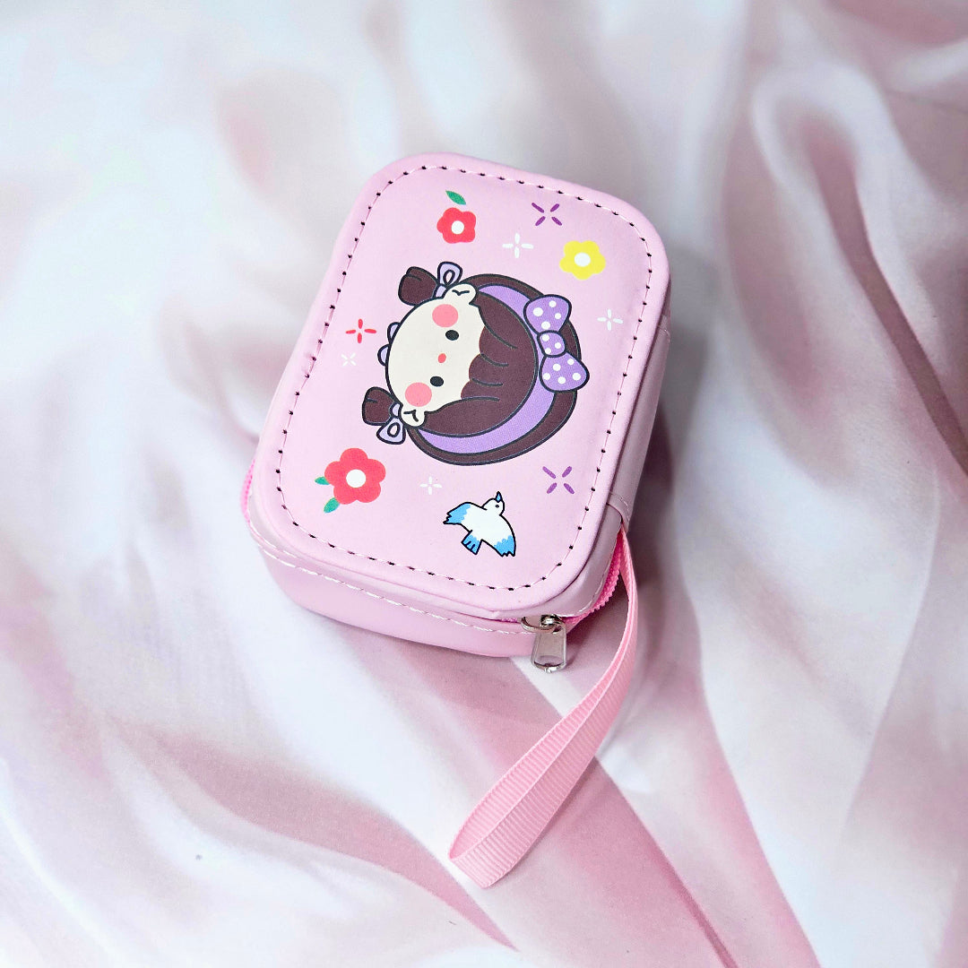 Assorted cute cartoon small storage coin pouches for kids in pink and purple with animal characters. www.usmile.toys